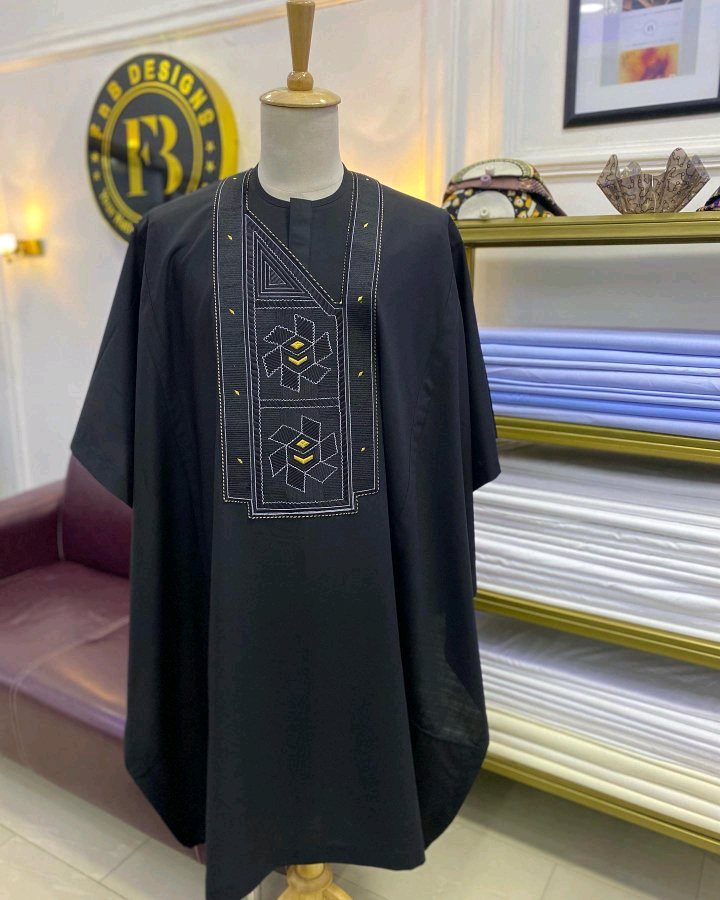 Black men’s Agbada with geometric embroidered chest panel and gold-toned detailing