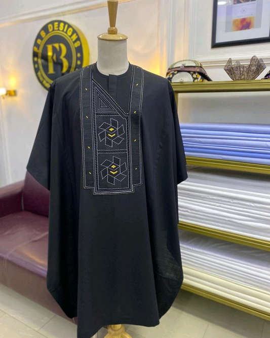 Black men’s Agbada with geometric embroidered chest panel and gold-toned detailing