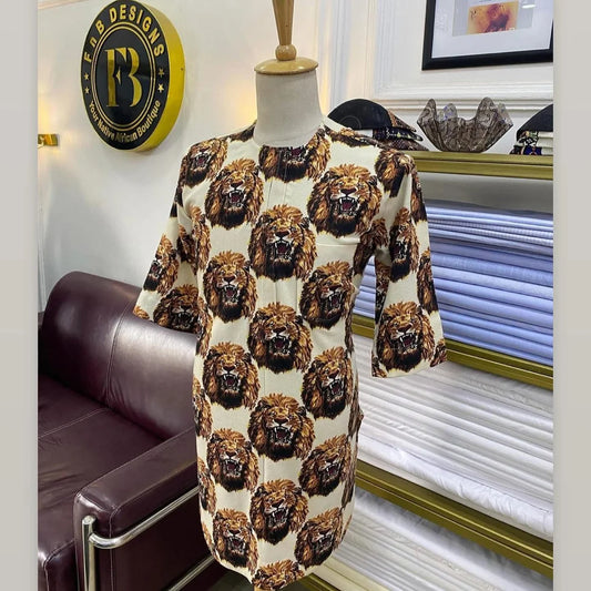 Cream long-sleeve Nigerian Isiagu featuring an all-over lion-head pattern